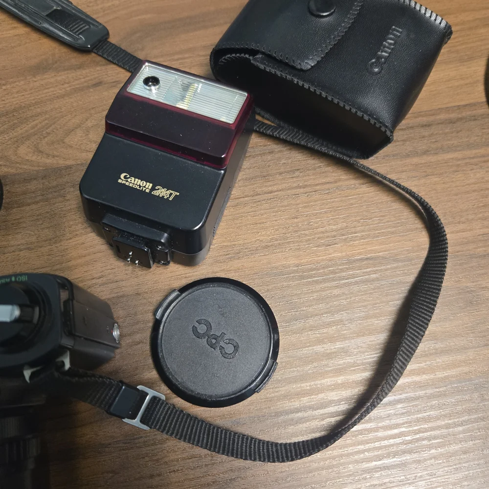 Canon Black SLR Camera with Textured Zoom Lens